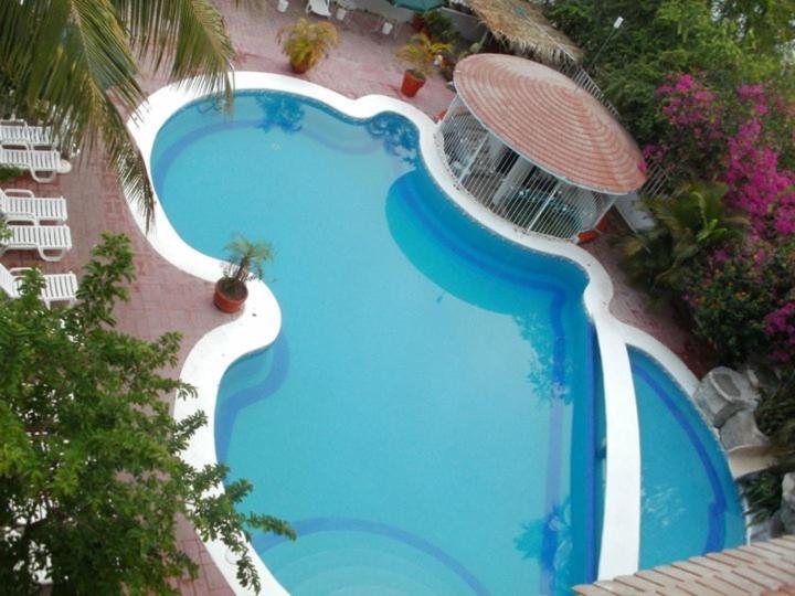 رينكون دي غوايابيتوس Hotel Y Suites Bugambilias المظهر الخارجي الصورة